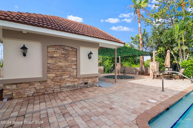 view of patio with a community pool