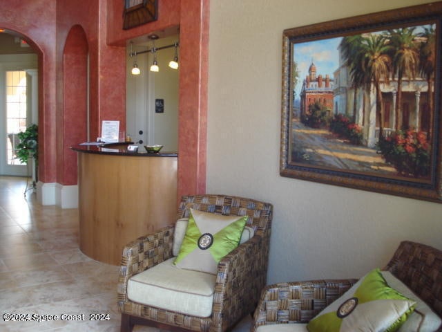 sitting room with tile patterned flooring