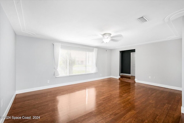 spare room featuring ceiling fan and wood-type flooring