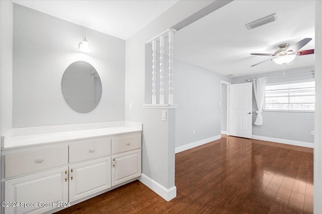 bathroom with ceiling fan, hardwood / wood-style flooring, and vanity