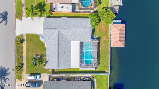 drone / aerial view with a water view