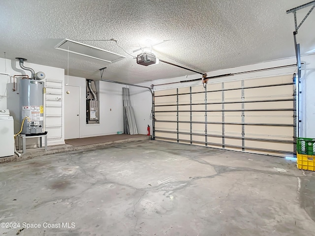 garage featuring a garage door opener, washer / clothes dryer, and water heater