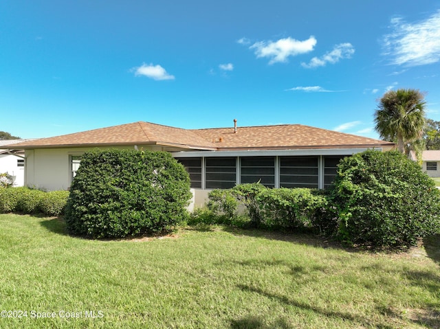 exterior space featuring a lawn