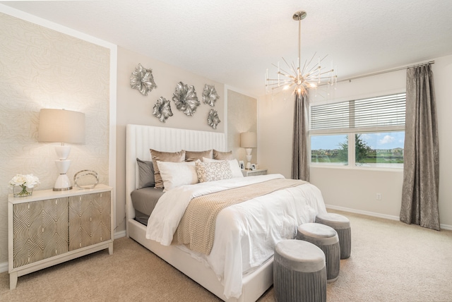 bedroom featuring carpet and a notable chandelier