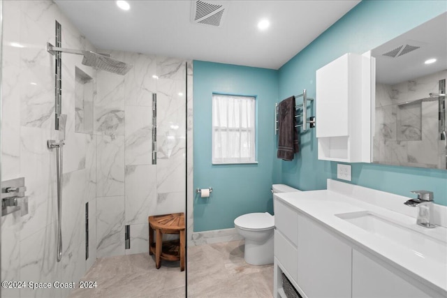 full bath featuring toilet, marble finish floor, vanity, and visible vents