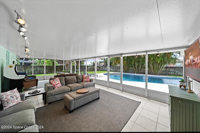 sunroom featuring a wealth of natural light