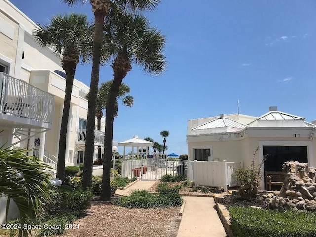 8600 Ridgewood Ave N Unit 1313, Cape Canaveral, FL 32920 - view of property's community with a gate