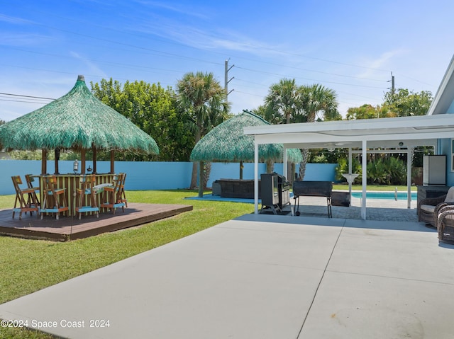 view of patio with a swimming pool side deck and an outdoor living space