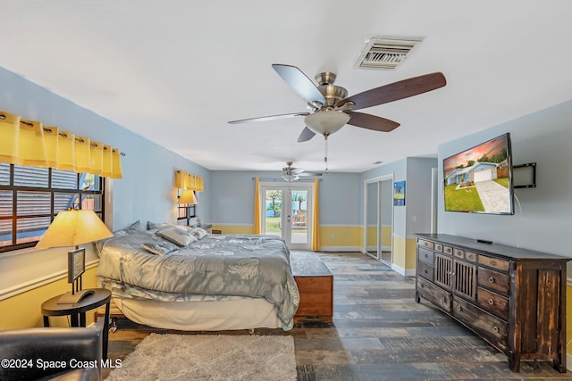 bedroom with french doors, dark hardwood / wood-style flooring, and ceiling fan