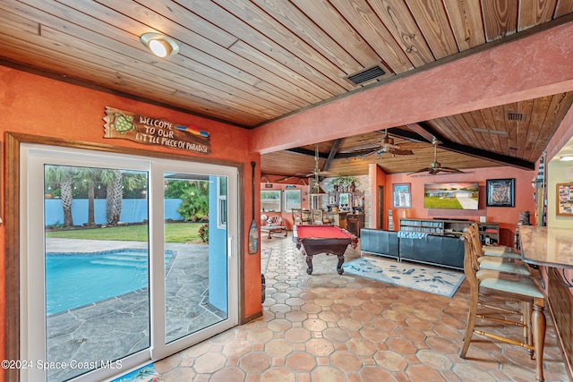 playroom featuring ceiling fan, lofted ceiling with beams, wooden ceiling, and pool table