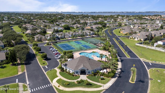 bird's eye view with a water view and a residential view