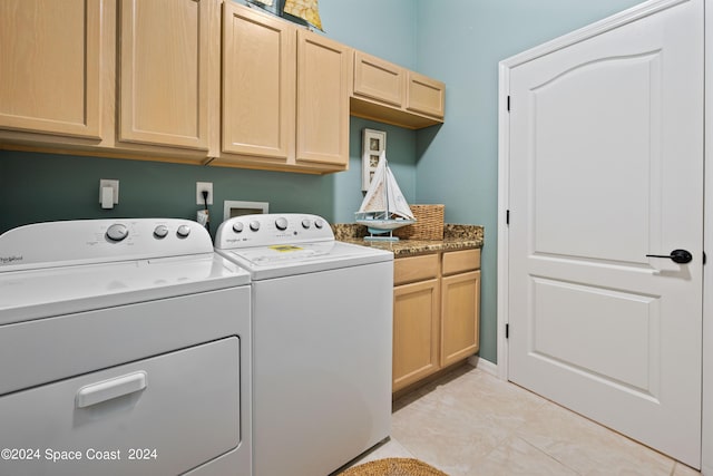 laundry area with cabinet space and washer and dryer