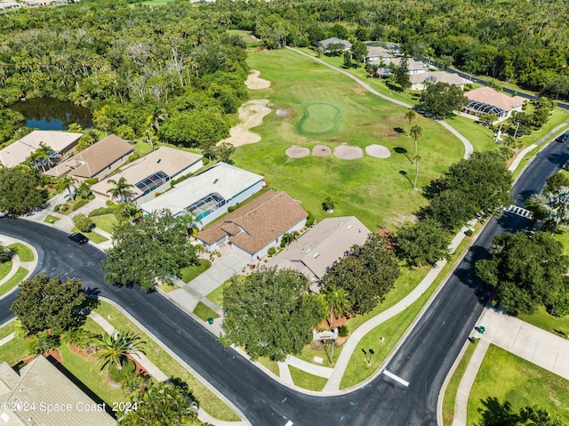 birds eye view of property with a residential view