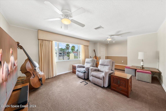 living room featuring crown molding, a textured ceiling, and carpet flooring