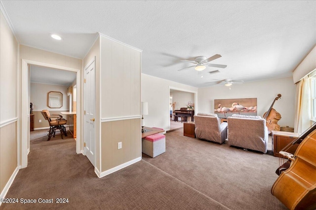 bedroom featuring carpet, a textured ceiling, and ceiling fan