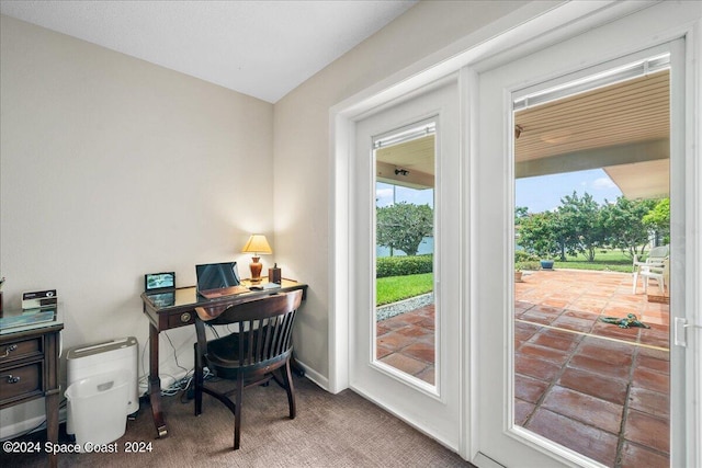 home office with carpet flooring and plenty of natural light