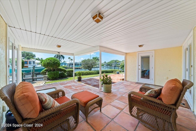 view of patio / terrace with a water view