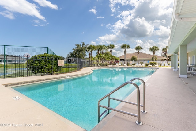 view of swimming pool featuring a patio