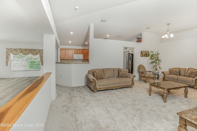 living room featuring light colored carpet, high vaulted ceiling, and a chandelier