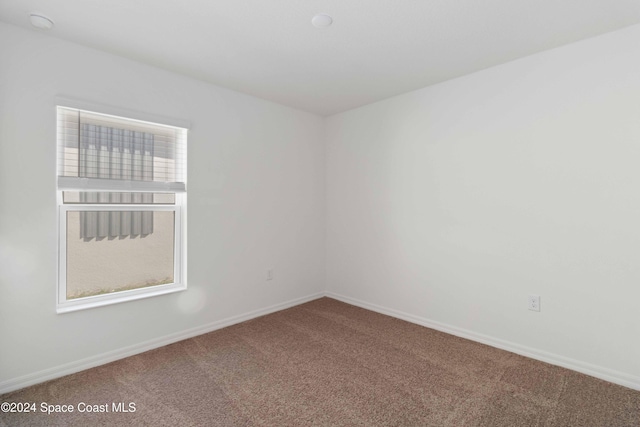 view of carpeted spare room