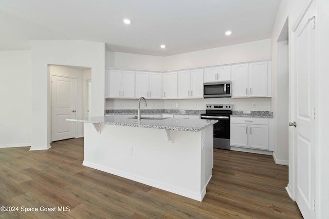 kitchen featuring white cabinets, appliances with stainless steel finishes, and sink