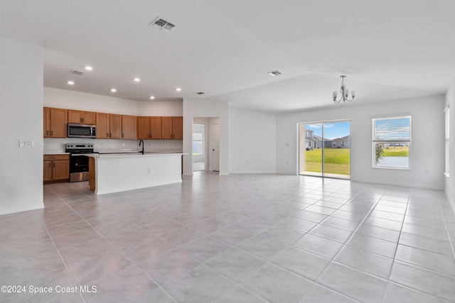 3480 Aramore Rd SE, Palm Bay, FL 32909 - unfurnished living room featuring recessed lighting, an inviting chandelier, visible vents, a sink, and light tile patterned flooring