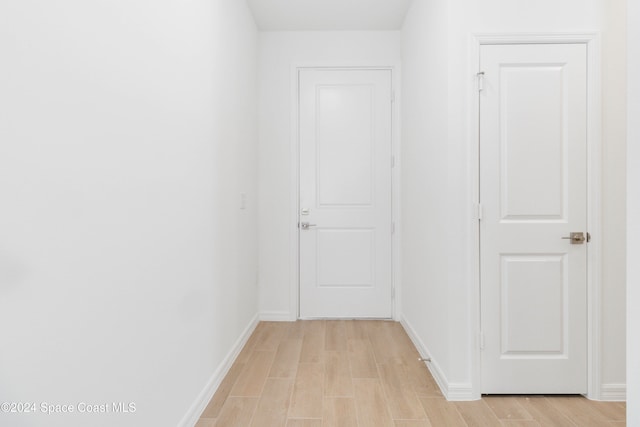 hall featuring light hardwood / wood-style flooring