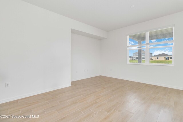 empty room featuring light hardwood / wood-style floors