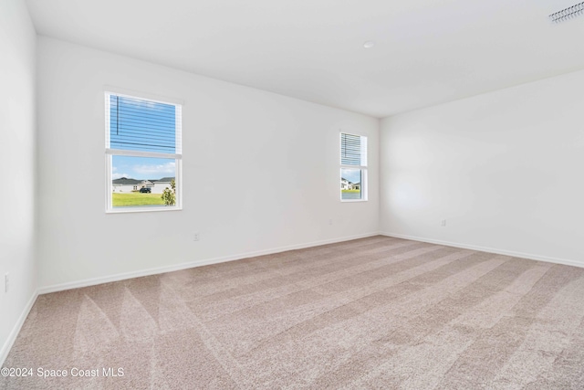 view of carpeted spare room