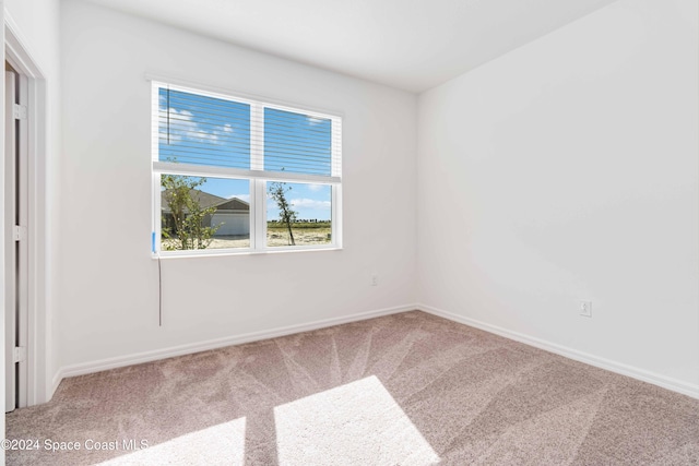 empty room with carpet floors