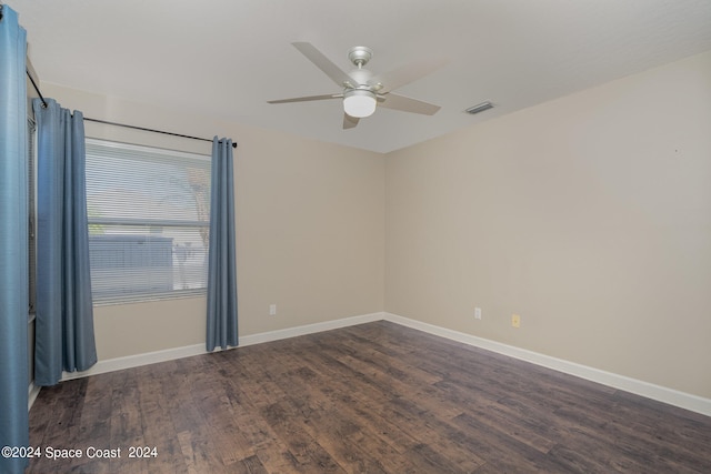 empty room with ceiling fan and wood-type flooring