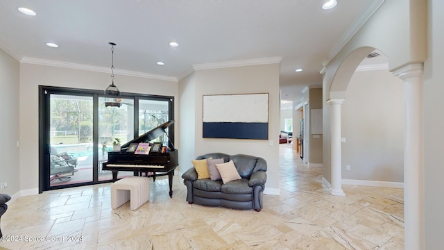 interior space with decorative columns and crown molding