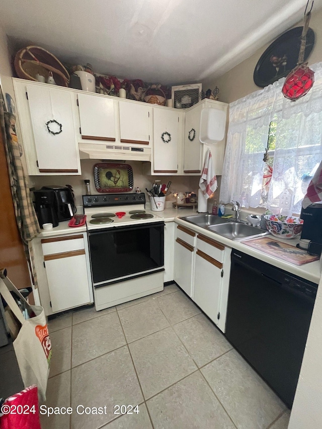 kitchen featuring light tile patterned floors, white electric stove, sink, black dishwasher, and white cabinets