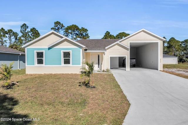 view of front of house featuring a front lawn, concrete driveway, roof with shingles, stucco siding, and a garage