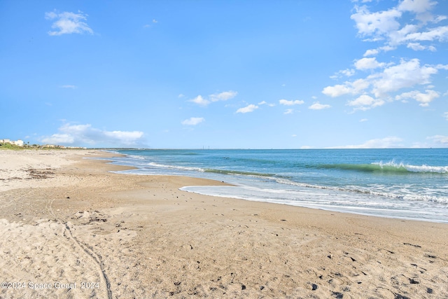 property view of water featuring a view of the beach