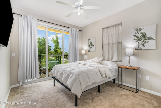 carpeted bedroom with ceiling fan and access to outside