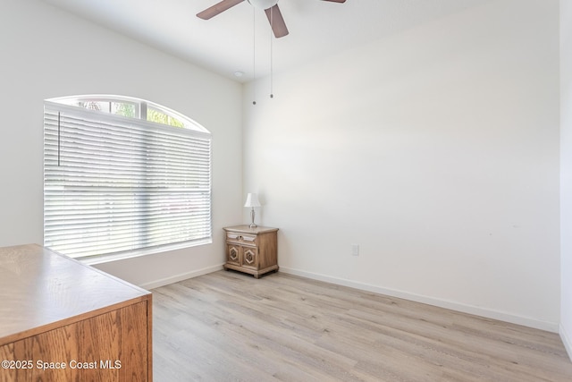 560 Remington Green Dr SE Unit 103, Palm Bay, FL 32909 - unfurnished room featuring light wood-style flooring, baseboards, and a ceiling fan