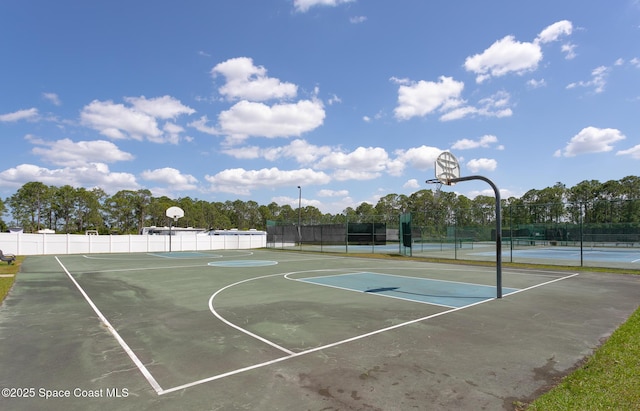 560 Remington Green Dr SE Unit 103, Palm Bay, FL 32909 - view of sport court featuring community basketball court, fence, and a tennis court