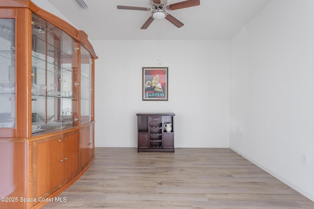 560 Remington Green Dr SE Unit 103, Palm Bay, FL 32909 - empty room with visible vents, ceiling fan, and wood finished floors
