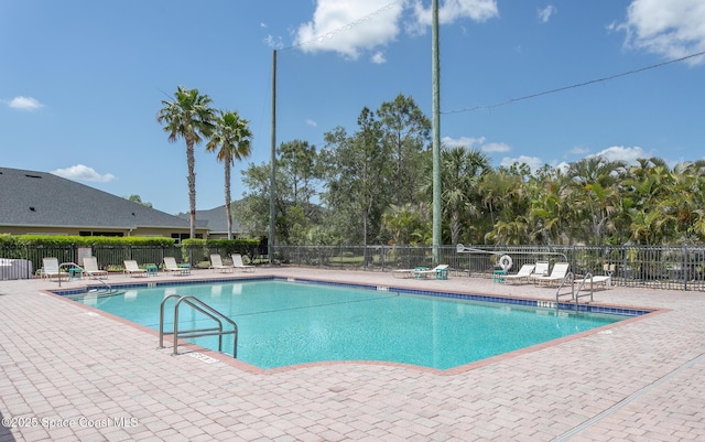 560 Remington Green Dr SE Unit 103, Palm Bay, FL 32909 - community pool with fence and a patio