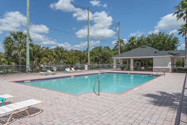 560 Remington Green Dr SE Unit 103, Palm Bay, FL 32909 - pool featuring a patio and fence