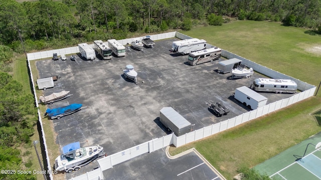 560 Remington Green Dr SE Unit 103, Palm Bay, FL 32909 - drone / aerial view with a forest view