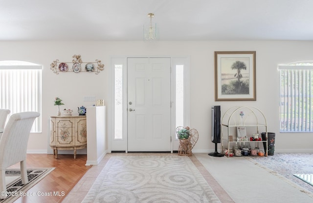 entrance foyer featuring baseboards