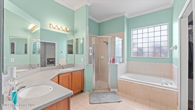 bathroom with vanity, shower with separate bathtub, crown molding, and tile patterned flooring