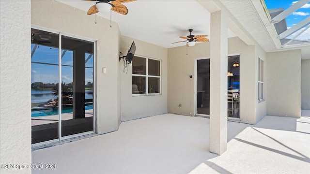 view of patio featuring ceiling fan