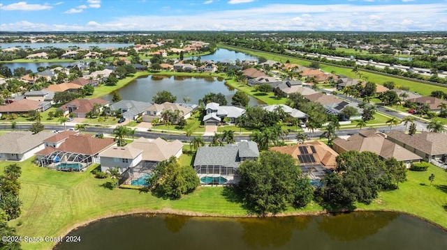 drone / aerial view with a water view