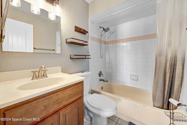 full bathroom with vanity, shower / bath combo with shower curtain, tile patterned flooring, and toilet