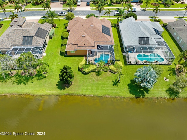 bird's eye view with a water view