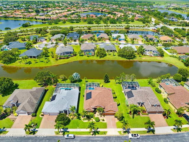 drone / aerial view with a water view