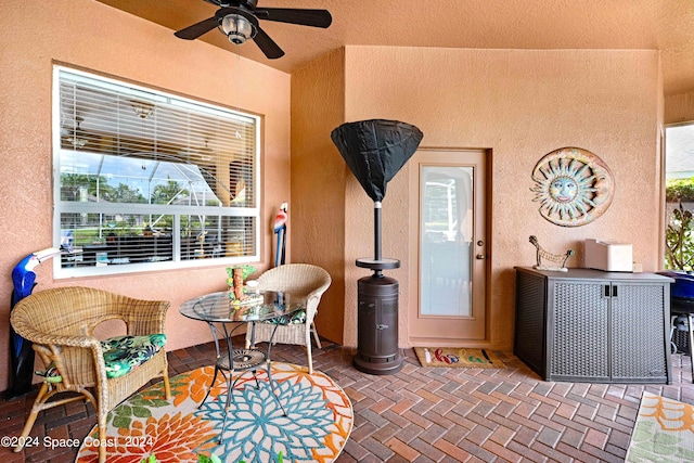 view of patio / terrace featuring ceiling fan